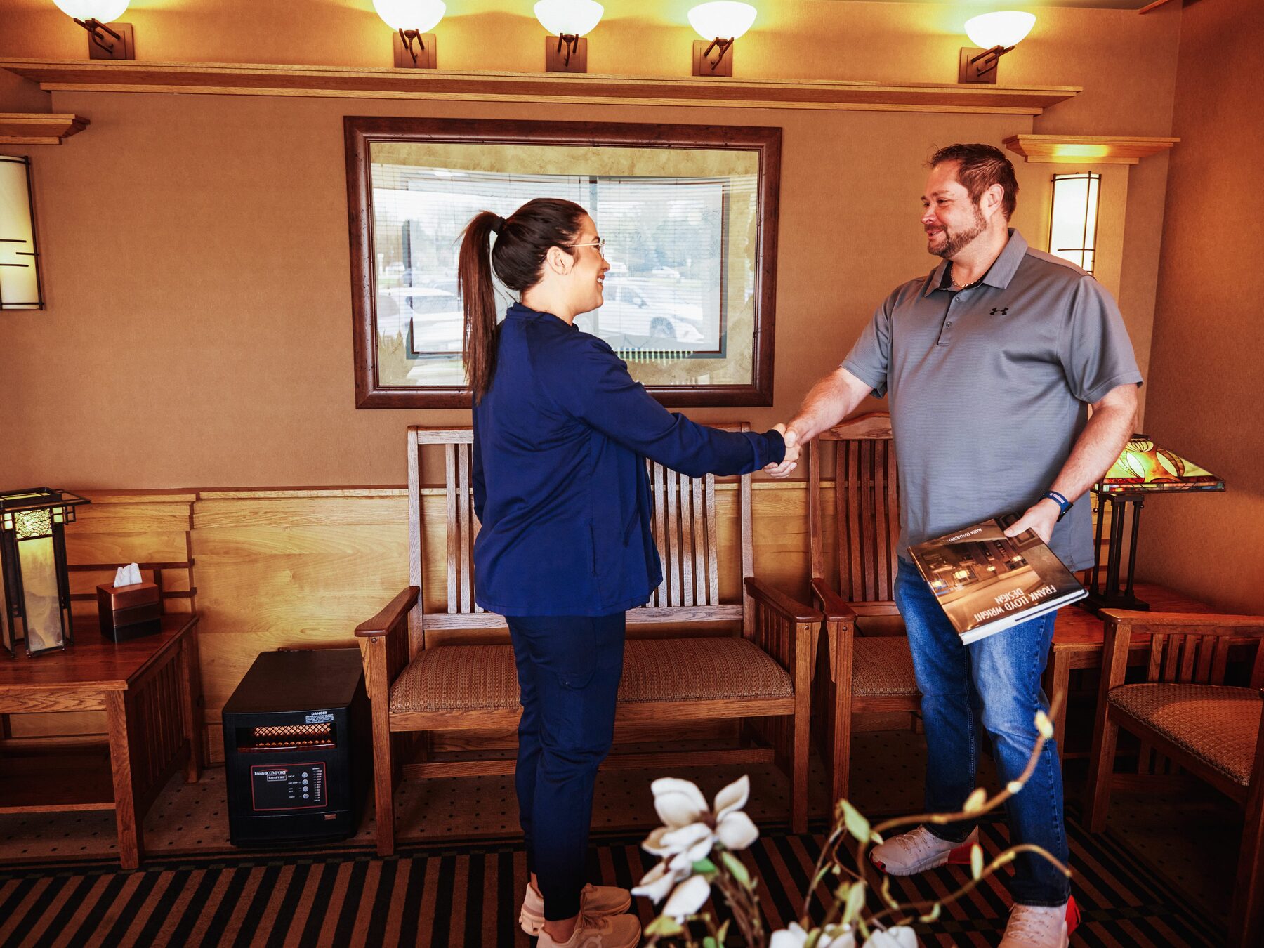 Welcoming a patient in our waiting area