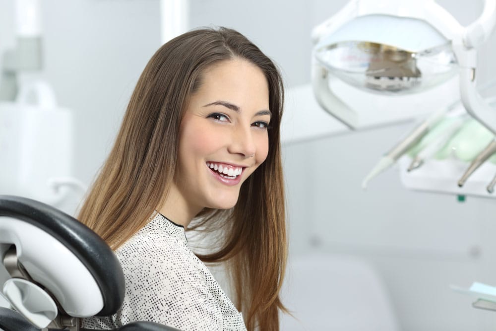 Patient smiling during a dental appointment